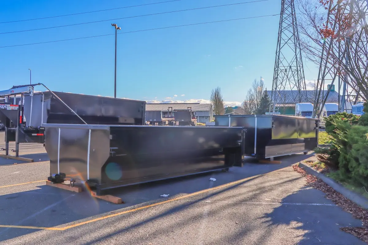 Roll-off dumpster ready for waste disposal at job site for Roofing Dumpster Rental in Horn Lake